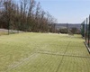 plocha určená pro míčové hry v zeleni za vyústěním ulice Radkovská