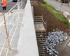 Postup stavebních prací na tunýlku v Prvomájové ulici a kresby na zdi kolem trati, 6.8.2021